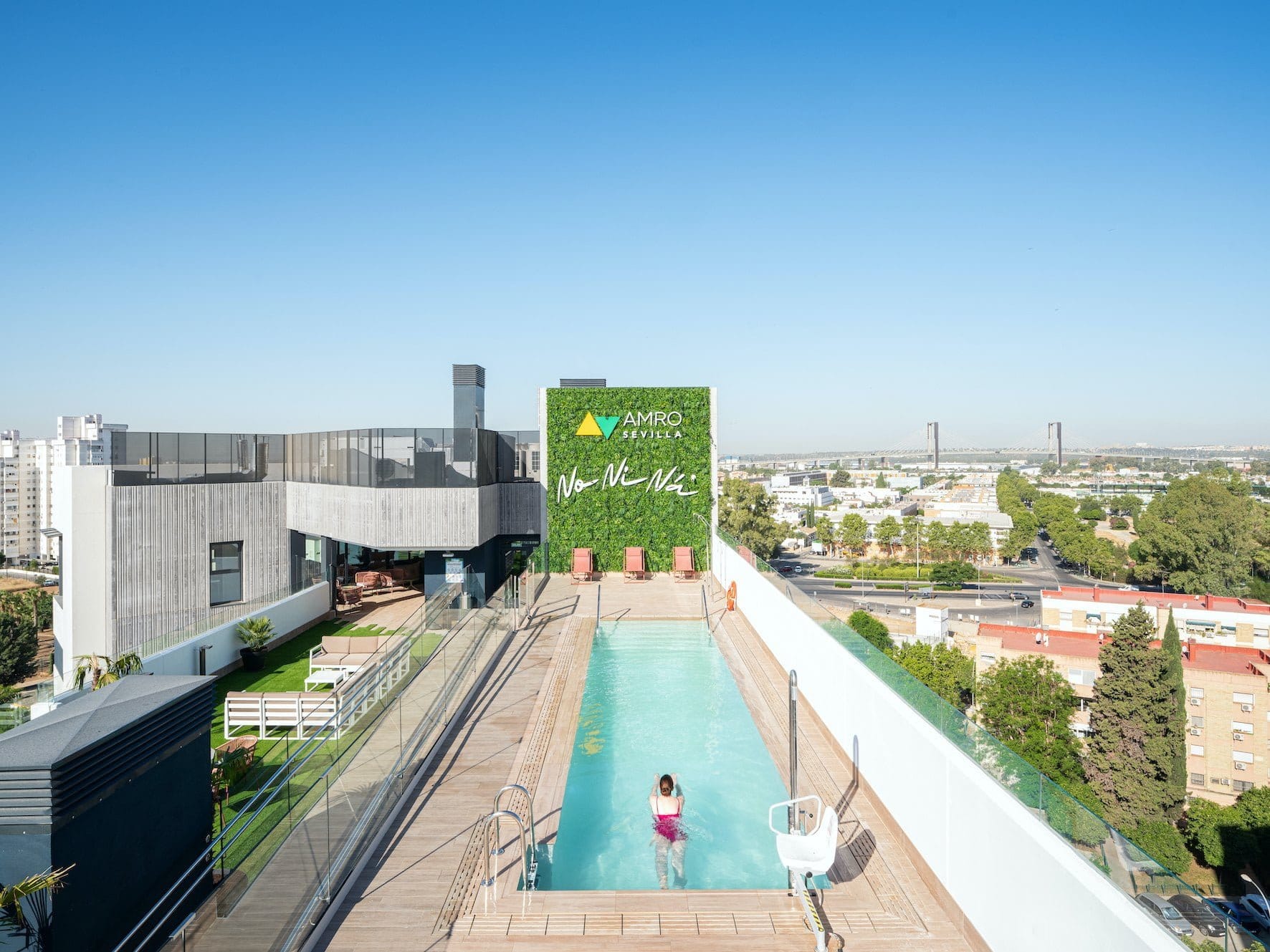 A photograph of the swimming pool at Amro Seville, the BREEAM 'Outstanding' student housing in Seville which highlights our Amro Seville real estate expertise. Explore Iberian opportunities today!